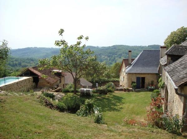 Vakantiehuis FermePostel tuin achterzijde